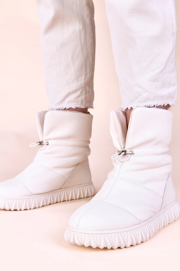 Beige Schneestiefel aus Naturleder mit Raffung Raschmi