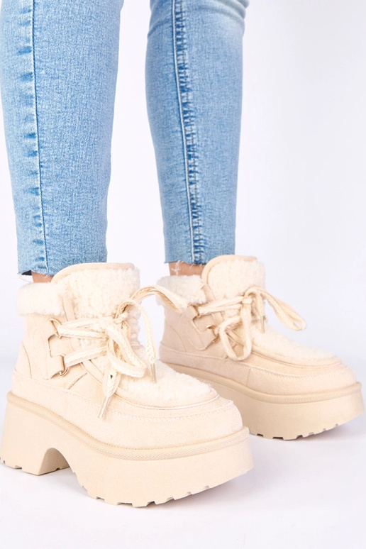 Sandfarbene Schneestiefel mit Pelz...