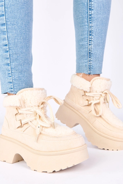 Sandfarbene Schneestiefel mit Pelz...