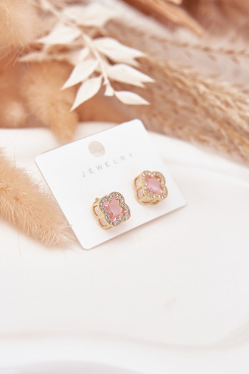 mit stilvollen Detailsi mit blitzenden Augen Gold-pinke Farbe