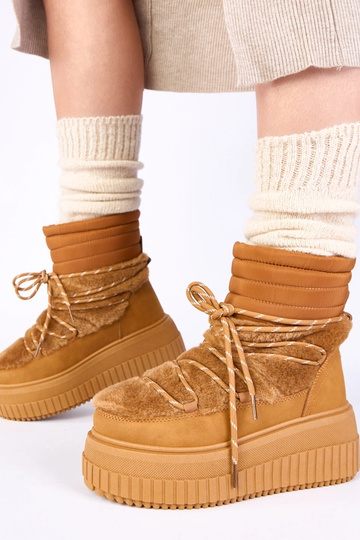 Braune Schneestiefel auf... 2