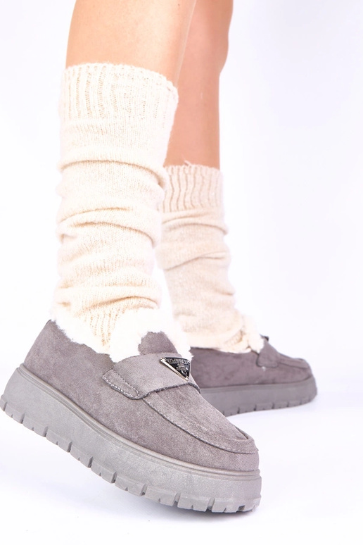Graue Plateauschuhe mit Fell Kirby