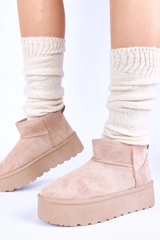 Sandfarbene Schneestiefel auf...