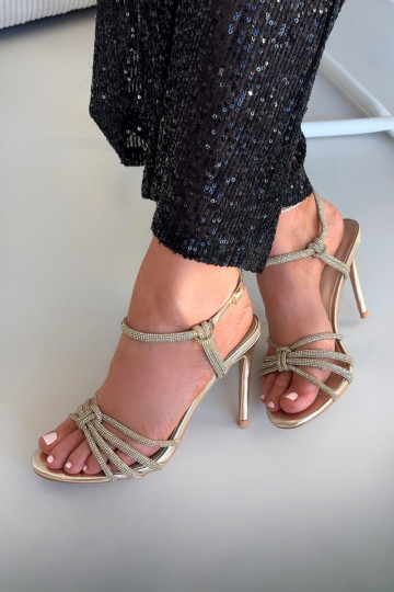 Tanelle goldfarbene Damen Sandalen mit dünnen Absätzen, Riemen und Zirkonia