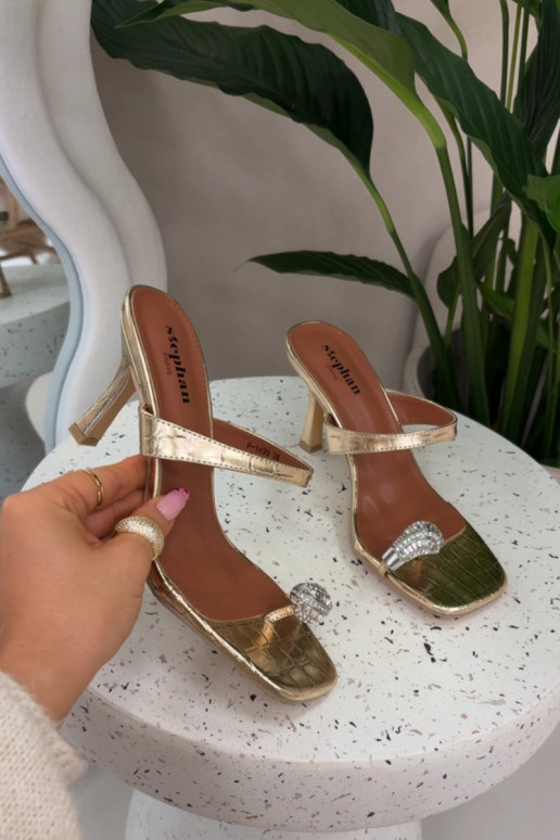 Damen goldene Pantoletten mit dünnen Absätzen und eleganten Details Lorissa