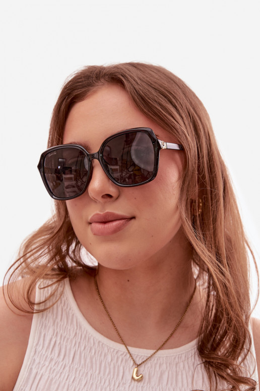 Sonnenbrille Feminin mit leuchtenden Augen schZuarze Farbe