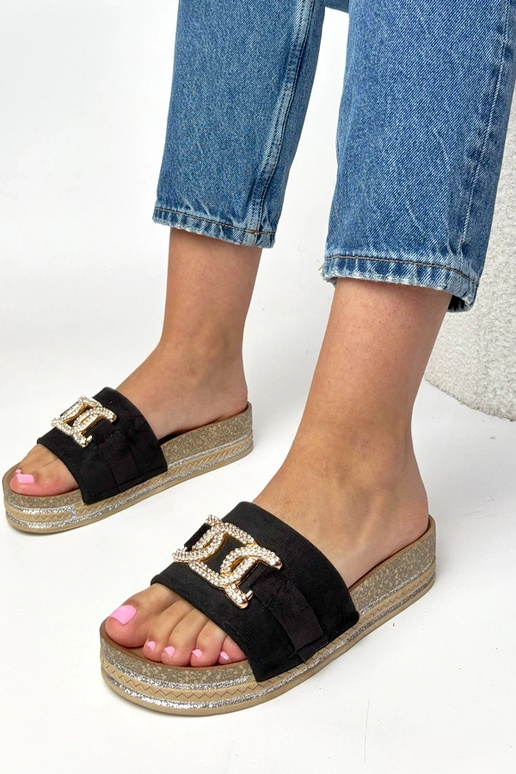 Schwarze Plattformslipper mit...