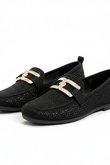 Schwarze Mokassins mit...