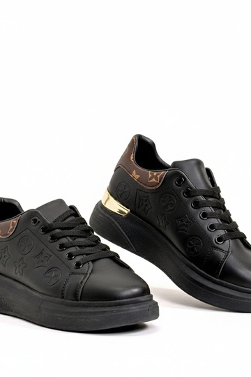 Schwarze Sportschuhe mit... 2