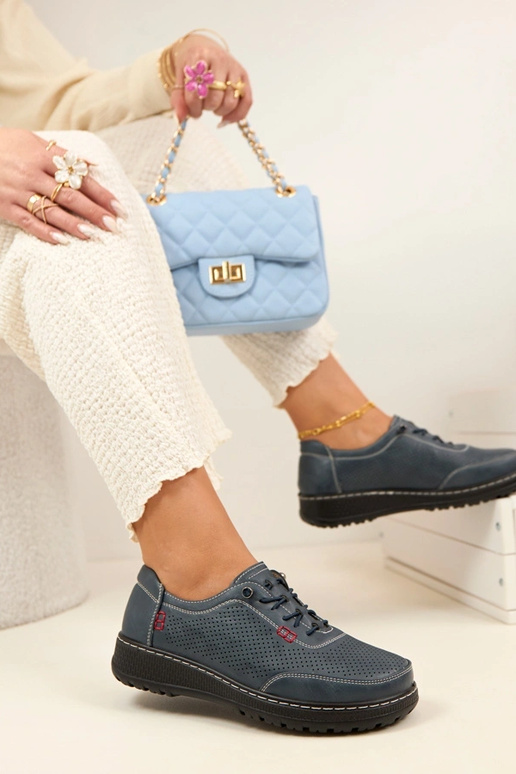 Dunkelblaue Lochmuster Halbschuhe...