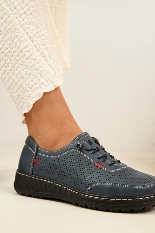 Dunkelblaue Lochmuster Halbschuhe...