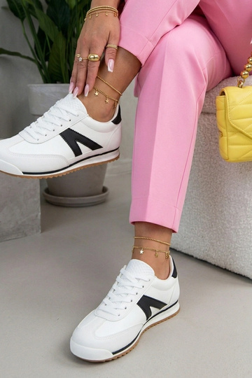 Weiße Sportschuhe mit... 2