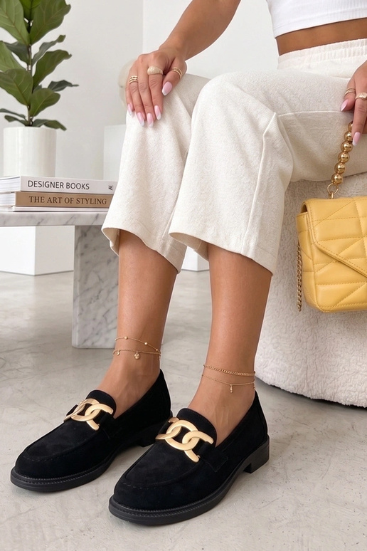 Schwarze Mokassins mit dekorativer...