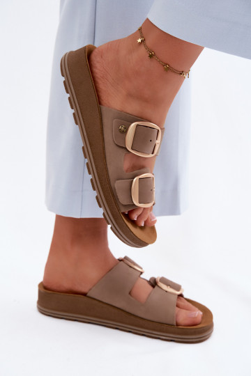 Lederne Slipper mit Schnallen in Sandfarbe