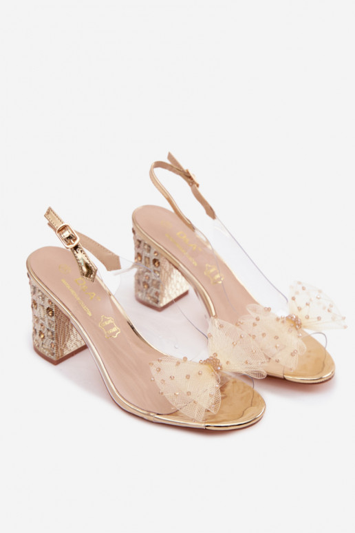 Sandalen mit Absätzen mit leuchtenden Augen SiateczkoZua mit Bändern D&A MR61-9010 goldene Farbe