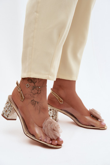 Goldene transparente Sandalen mit Absätzen und funkelnden Nieten D&A