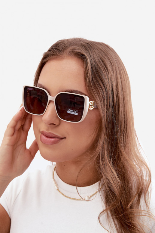 Sonnenbrille mit dekorativen Details in Sandfarbe