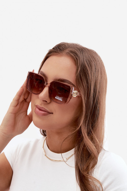 Sonnenbrille mit dekorativen Details in Rosa