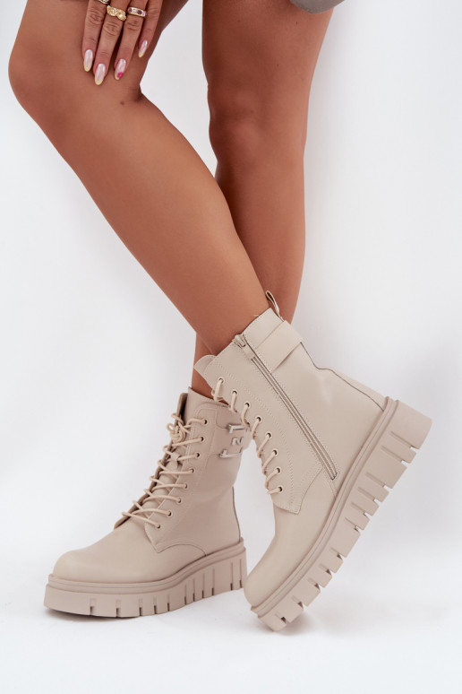 Wärmende Stiefeletten mit Plattform und dekorativen Details in Elfenbein Lyrana