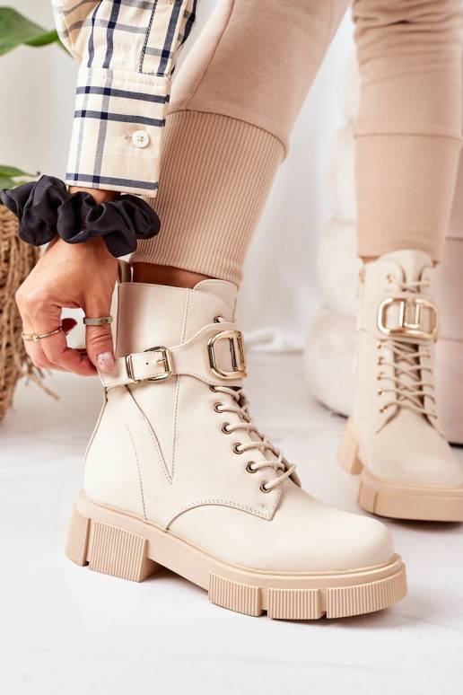 Beheizte Stiefel mit goldenen...