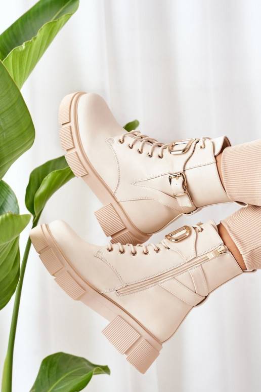 Beheizte Stiefel mit goldenen...