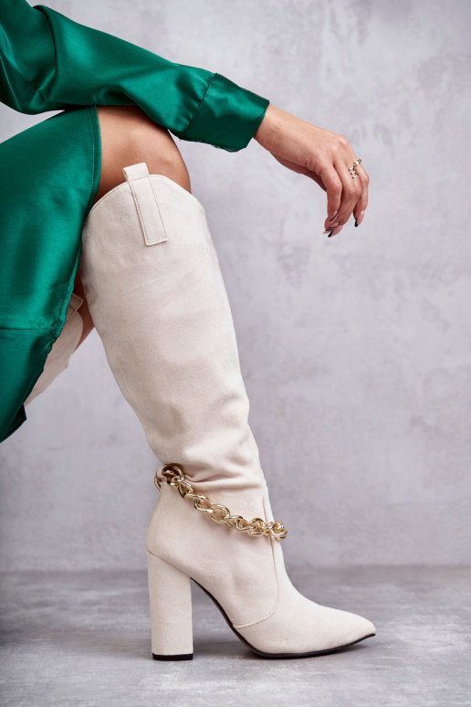 Beheizte Stiefeletten mit Ketten in... Beheizte Stiefeletten mit Ketten in...