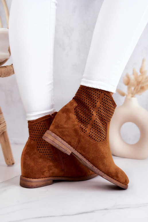 Braune Wildlederstiefel mit... Braune Wildlederstiefel mit...