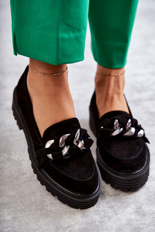 Schwarze Schuhe aus Wildleder von... Schwarze Schuhe aus Wildleder von...