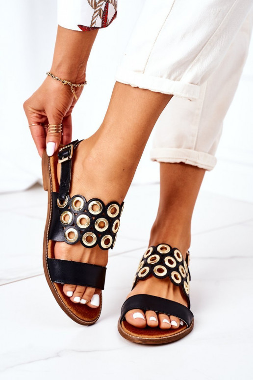 Schwarze, durchbrochene Sandalen. Schuhe für Damen