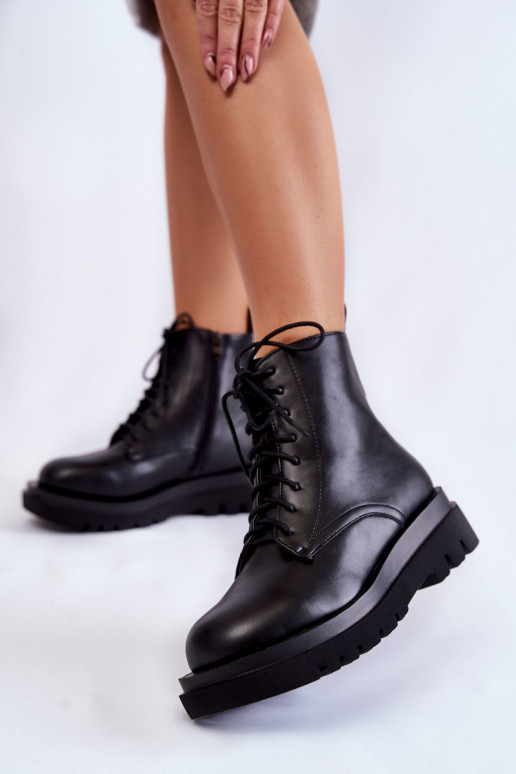 Schwarze beheizte Stiefel mit... Schwarze beheizte Stiefel mit...