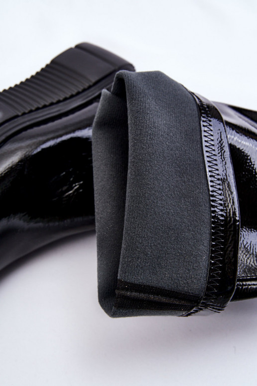 Lange Schuhe mit Plateau in schwarzer... Lange Schuhe mit Plateau in schwarzer...