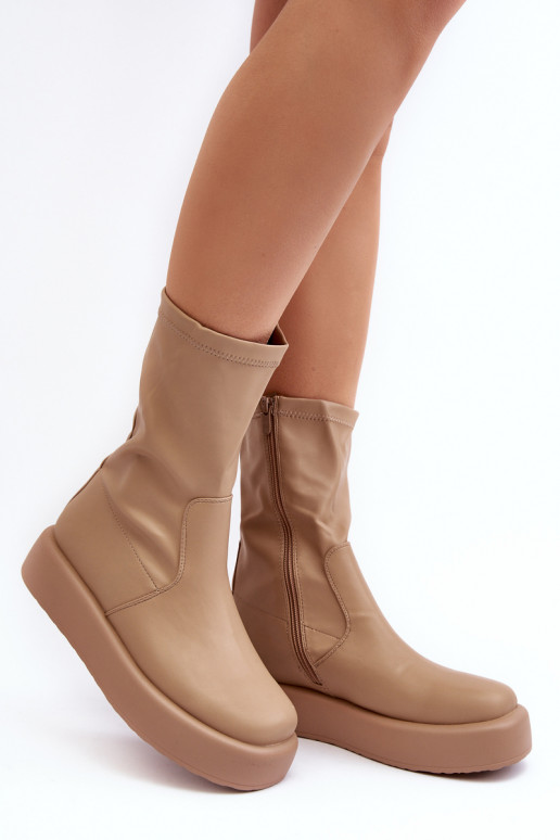 Beigefarbene Plateaustiefel von Algedi Beigefarbene Plateaustiefel von Algedi