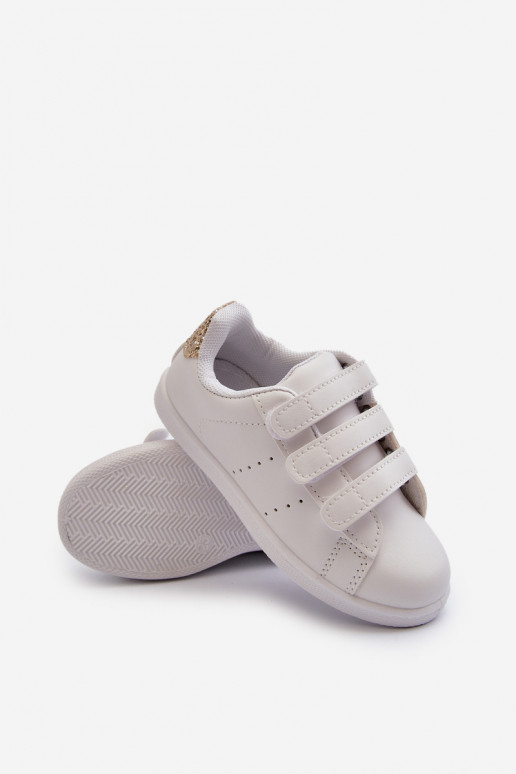 Kinder-Sneaker mit Klebeverschlüssen in der Farbe Weißgold „Cute Girl“. Kinder-Sneaker mit Klebeverschlüssen in der Farbe Weißgold „Cute Girl“.