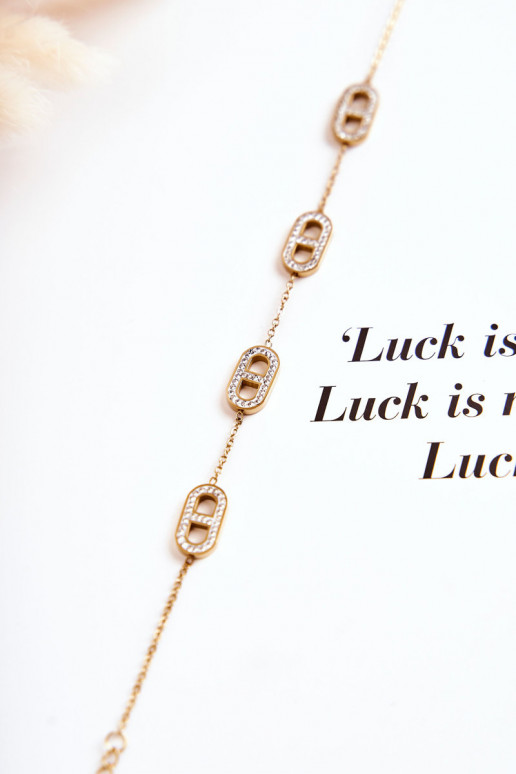 Damenarmband mit funkelnden Augen in Goldfarbe Damenarmband mit funkelnden Augen in Goldfarbe