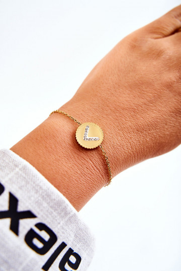 Damenarmband mit Ornamenten und Zirkonaugen in Goldfarbe 2