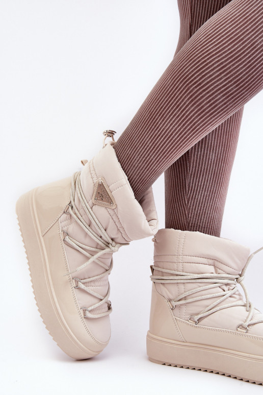 Schneestiefel mit Plateau und stylischen Details in Beige Fleure Schneestiefel mit Plateau und stylischen Details in Beige Fleure
