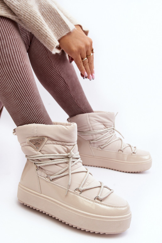 Schneestiefel mit Plateau und stylischen Details in Beige Fleure Schneestiefel mit Plateau und stylischen Details in Beige Fleure