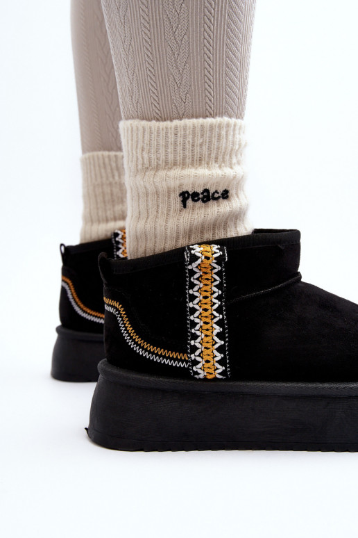 Gemusterte Plateau-Schneestiefel aus schwarzem Udra Gemusterte Plateau-Schneestiefel aus schwarzem Udra