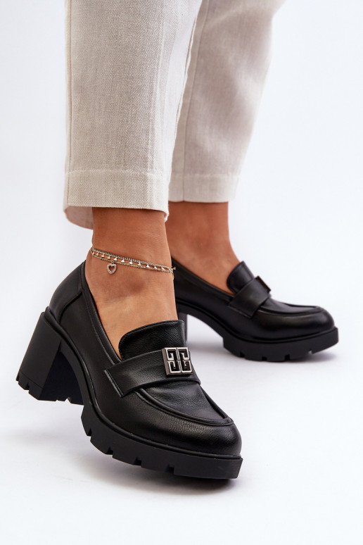 Schuhe mit breitem Absatz und Ornamenten in der Farbe Schwarz von Ranunca Schuhe mit breitem Absatz und Ornamenten in der Farbe Schwarz von Ranunca
