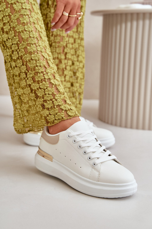 Niedrige Freizeitschuhe mit Plateau aus Öko-Leder in der Farbe Weiß-Sand Nevelena Niedrige Freizeitschuhe mit Plateau aus Öko-Leder in der Farbe Weiß-Sand Nevelena