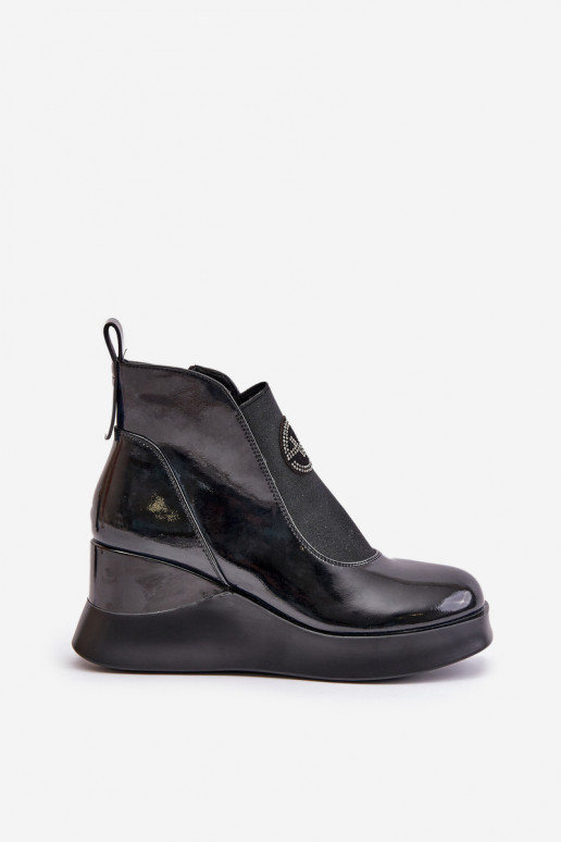 Lackierte und gefütterte Stiefeletten... Lackierte und gefütterte Stiefeletten...