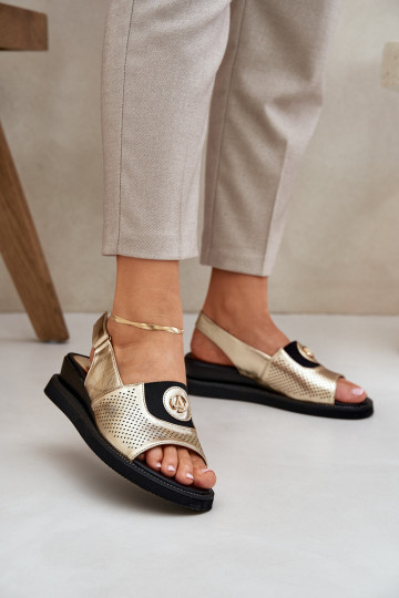 Damensandalen mit einer Plattform goldene Farbe Isnnoria