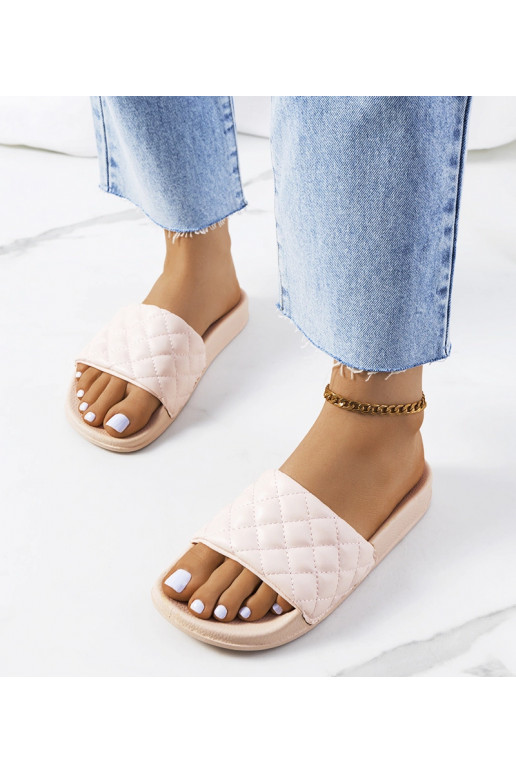 Kates rosa gesteppte Flip-Flops