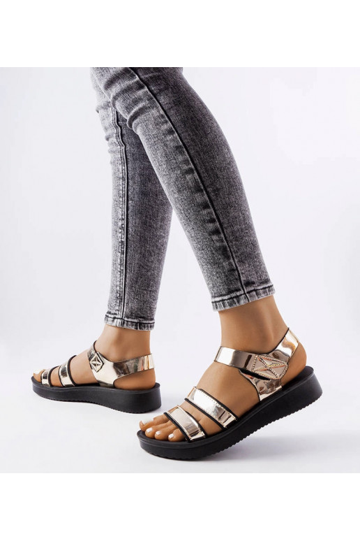 Brices – Sandalen aus goldenem Lackleder